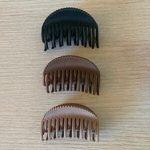 BRAND NEW Set of Three Hair Claw Clips in Black, Brown, and Tan. NEVER WORN!